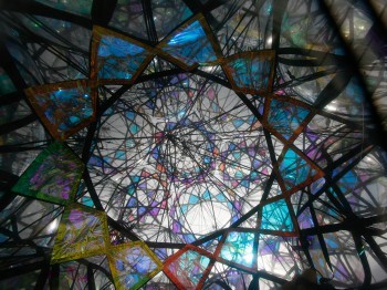 Large geometric sculpture of colored panes.
