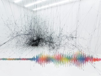 A multi-colored sound wave is juxtaposed on a photo of a white gallery with a dense web of black fibers