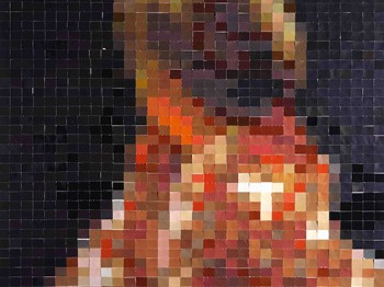 Abstract red, black, and brown mosaic roughly in the shape of a person