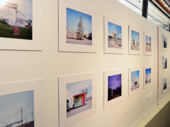 A gallery wall of photographs.