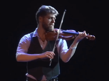 A man performs violin