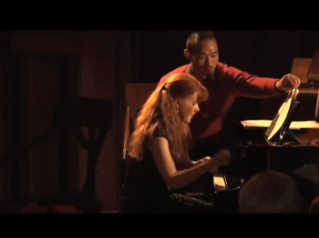 Video still image of a pianist performing