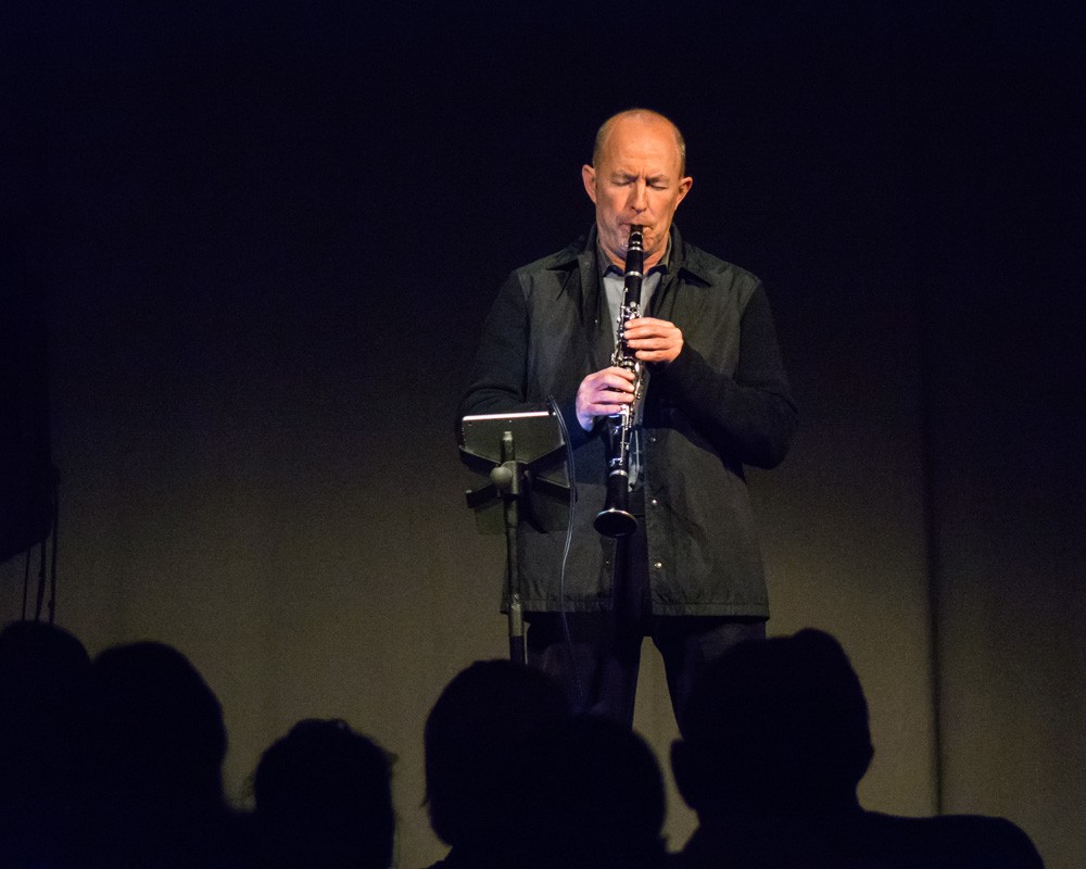 A man performs clarinet.