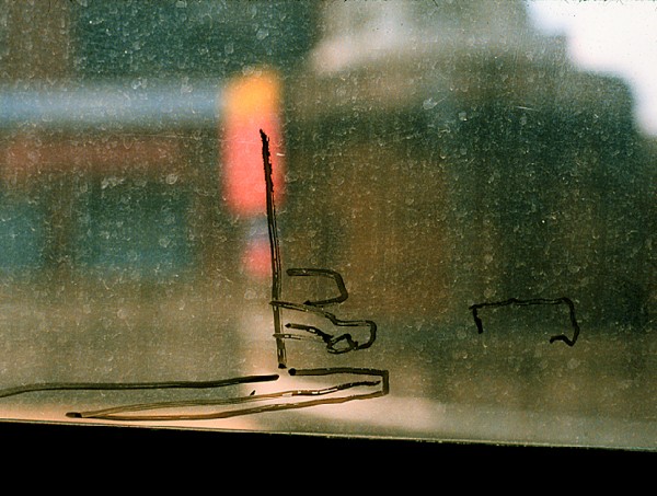 Grady Gerbracht, Commutes: NJ Transit Series, image on bus window. Photo: Courtesy of the artist.