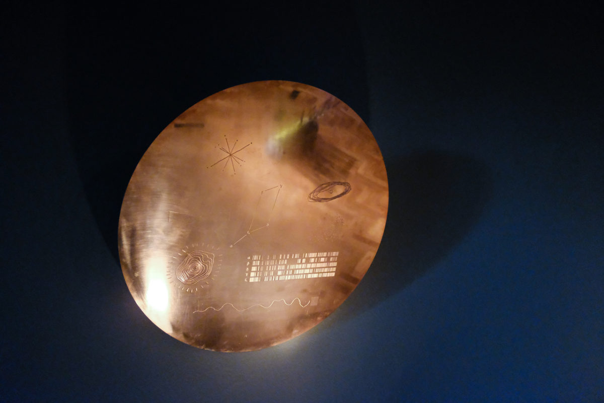Close up view of bronze plage with engravings of constellation of Lyra.