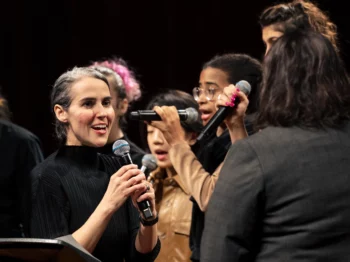Clarice Assad sings with MIT Vocal Jazz Ensemble at Hearing Amazonia performance in March 2023.
