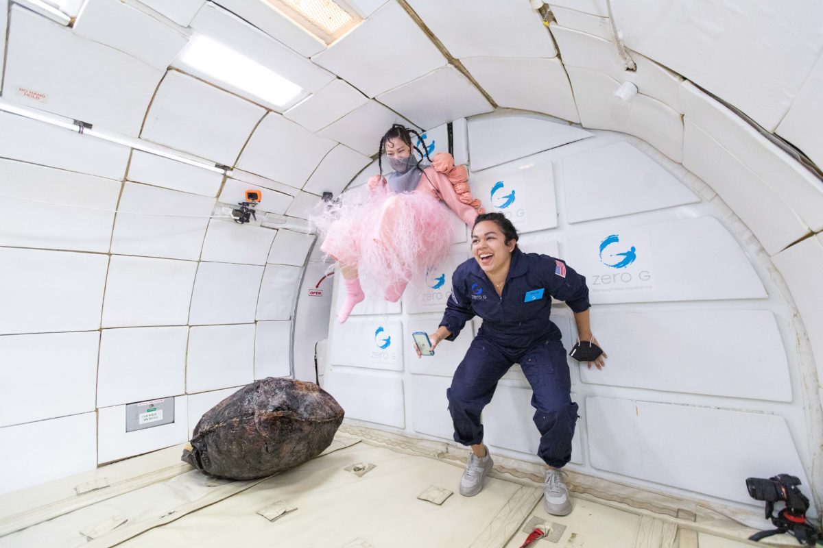 Rae Yuping Hsu and Nancy Valladares in floating in a zero gravity chamber.