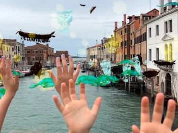 Composited photo of multiple hands close to the camera reaching up toward surreal centipede-like insects and green ambiguous amoeba-like graphics floating in the air over a waterway in Venice with large buildings to either side.