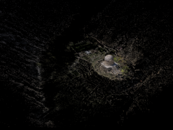 Aerial view of the Topdara Stupa in the dark.