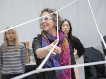 Janet Echelman smiling in her "In Tension" Workshop at MIT.