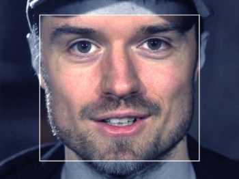 Andreas Refsgaard wearing a hat and looking straight into the camera with a smile.
