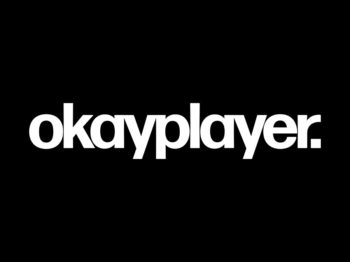 Text logo of okayplayer in white with a black background.