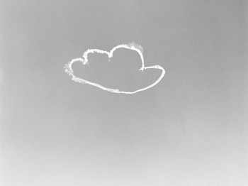 A cloud outline in the shape of a cartoon cloud above a city skyline.